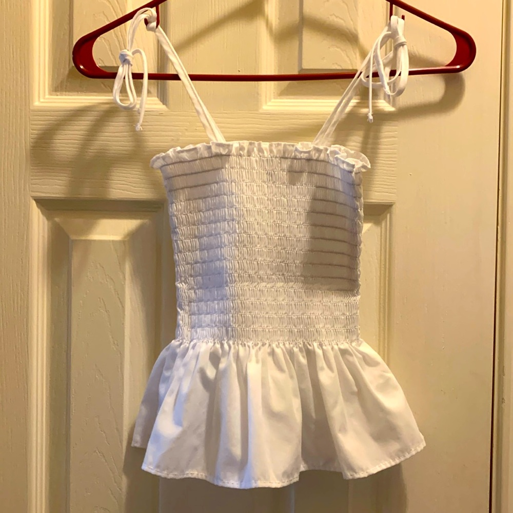 LOVE ADY Smocked Peplum Top